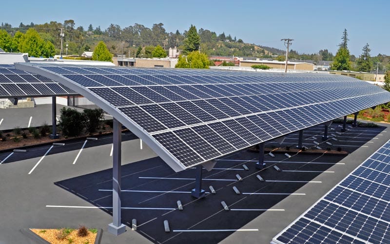 Solar carport parking shades UAE - photovoltaic solar panel integrated car parking shade structure in Dubai