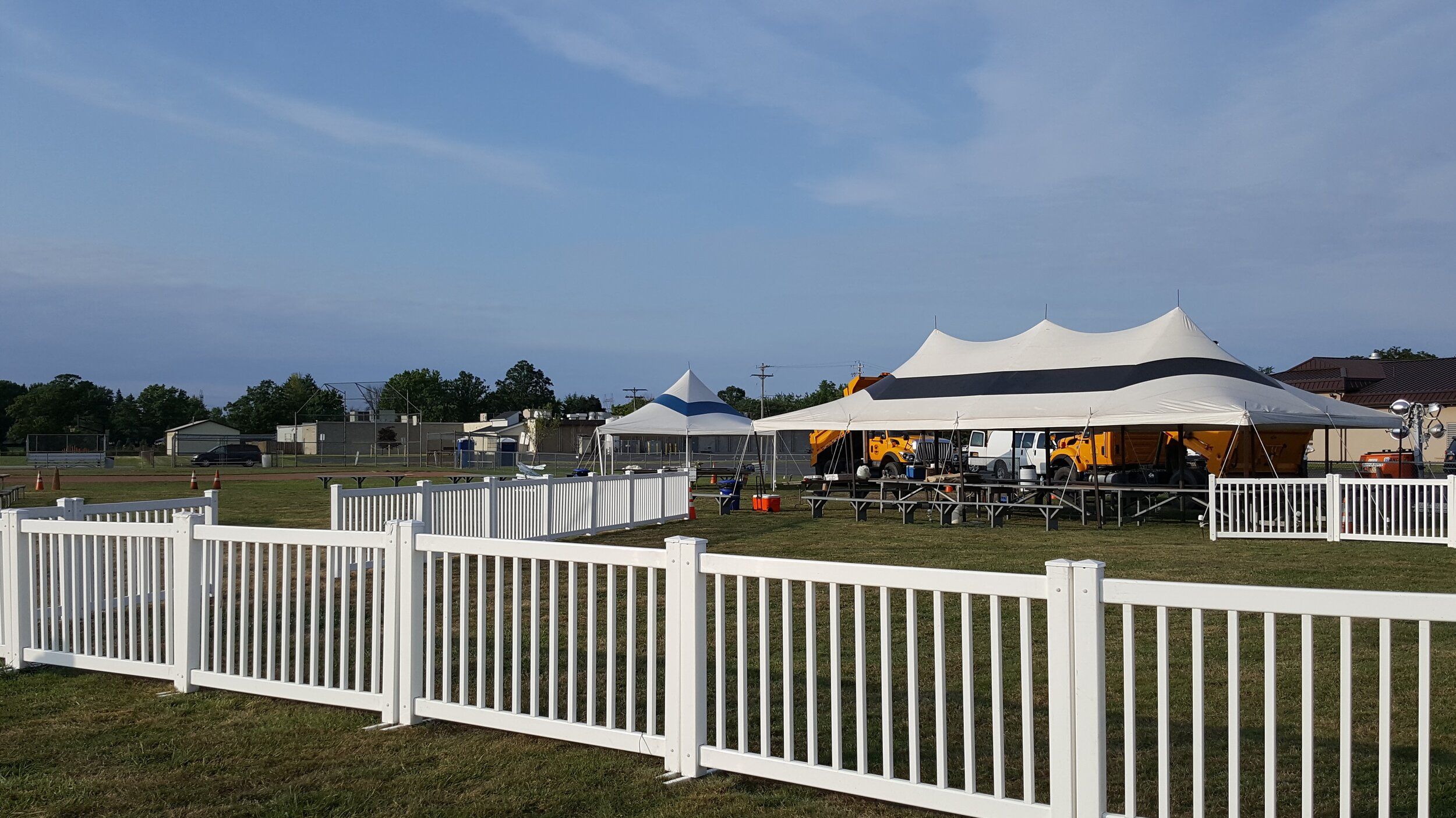 Decorative white picket fencing rental for elegant outdoor events
